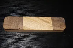 Rectangular clapper with walnut burl ends and a bright curly chestnut center